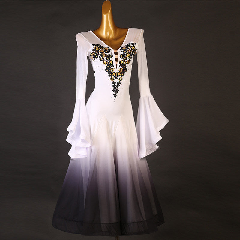 Ivory ballroom competition dress with black ombre hem on the mannequin
