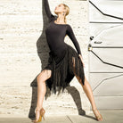 Black side-tie fringe wrap skirt, full-length dance pose