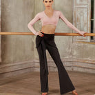 Wrap Tie Latin Dance Pants High Waist Bell Bottom Practice Trousers in Black, on model