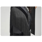 Close view of the black fringe and velvet panels