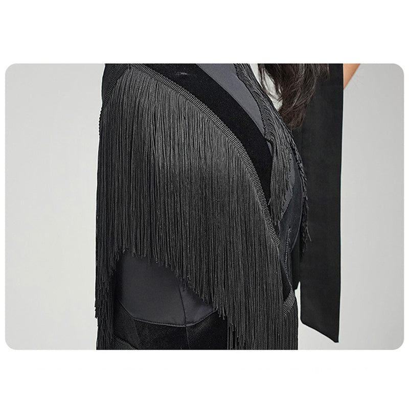 Close view of the black fringe and velvet panels