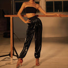 Glossy Sauna Latin Dance Pants High Waist Cuffed Practice Joggers in Black, on model