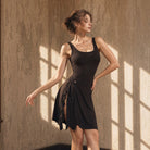 Black wrap skirt with beaded fringe ruffle, side view