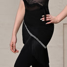 Black rhinestone fringe hip skirt for Latin and salsa dance, close-up side view