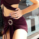 Wine red sun buckle draped Latin dance skirt for salsa practice, front view