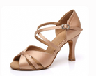 tan salsa dance shoes front view with crisscross straps and buckle closure