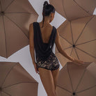 Back view of the draped cowl panel on the TTdancewear black lace Latin dance leotard bodysuit