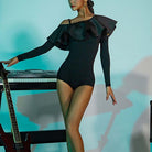 Dancer in the black TTdancewear ruffle off shoulder long sleeve Latin dance leotard bodysuit