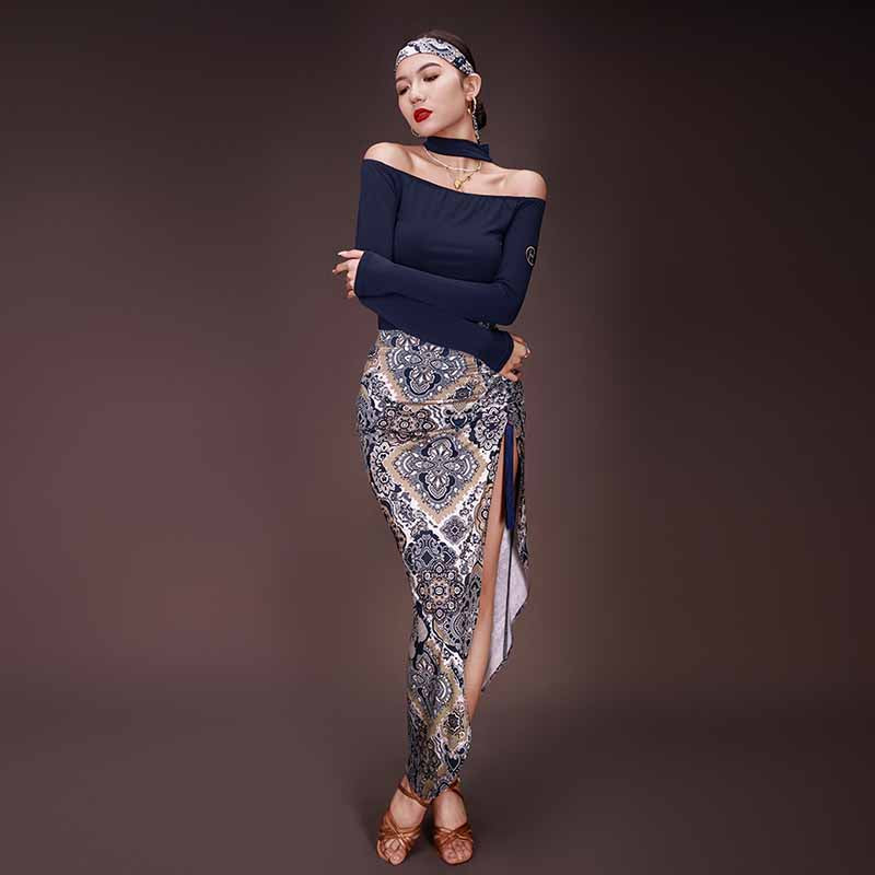 Paisley print wrap Latin dance skirt worn with a navy top, front view