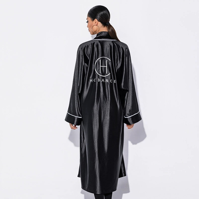 Black satin dance robe with HC DANCE logo, back view