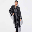 Black satin dance robe tied with belt, front view