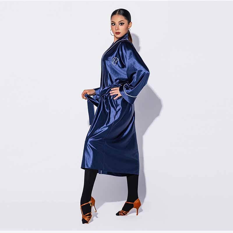 Blue satin dance robe tied with belt, side view