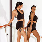 Black ruched dance shorts at the barre
