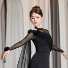 Black ballroom dance bodysuit with draped shoulder cape