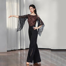 Tan lace bell sleeve ballroom leotard, arms open