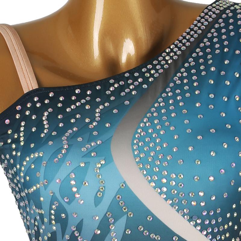 Close-up of rhinestone swirls on the blue ombre bodice