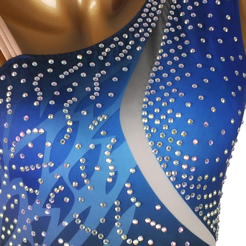 Close-up of rhinestone swirls on the royal blue bodice