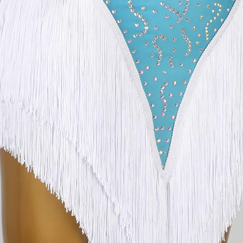 Close-up of the white fringe hem with stoned blue panel