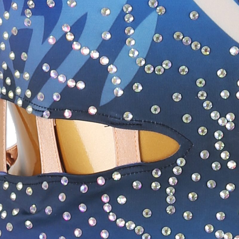 Close-up of the waist cutout edged with rhinestones