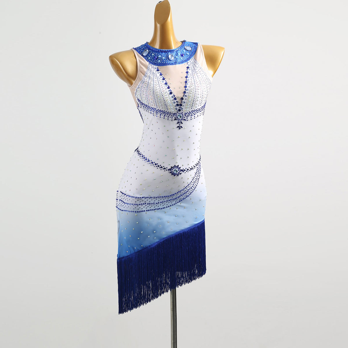 White and blue ombre beaded motif dress, angled front view on mannequin