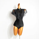 Black flutter sleeve dotted mesh dance bodysuit on a form