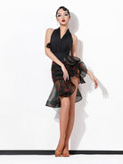 Black halter Latin leotard worn with a ruffle skirt