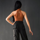 Tan halter Latin dance leotard, back view