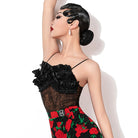 Black lace Latin dance bodysuit, arms raised