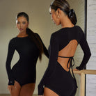 Black cut out back leotard, front and back in the mirror