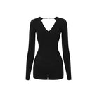 Black long sleeve open back Latin dance leotard, flat lay