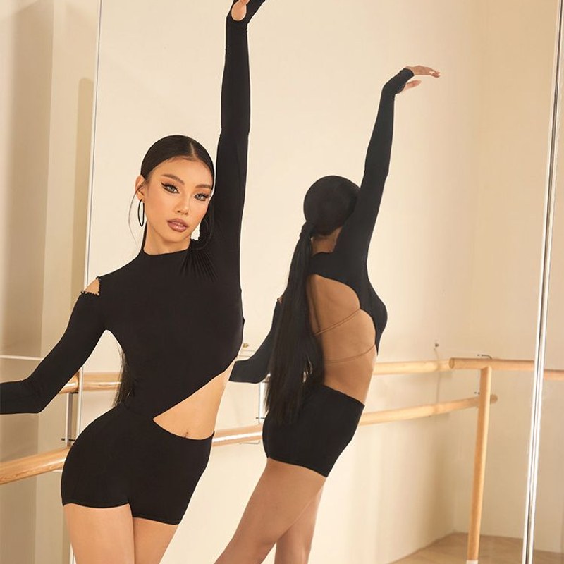 Black mock neck cutout leotard, front view with arm raised