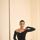 Black long sleeve salsa dance dress, pose at the barre