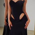 Black sweetheart bodice on a halter dance dress, close up