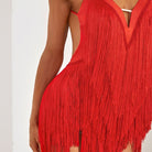 Red layered fringe on a Latin dance dress, close up