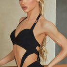 Black crossover cutout on a salsa dance dress, close up