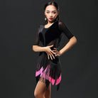 Black velvet fringe dance dress with mesh sleeves, pose