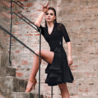 Black mesh sleeve Latin salsa dance dress, pose on the stairs