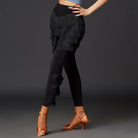 Black Latin dance pants with layered hip fringe, side view