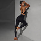 Black dance leggings, leg lift side view