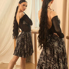 Grey Leopard ruffle skirt, front view in the mirror