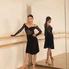 Black ruffle skirt, front view at the barre