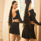 Black beaded hem skirt, back view in the mirror