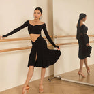 Black polka dot skirt, front view in motion