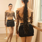 Black tiered fringe mini skirt, front and back view