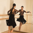 Black sheer mesh skirt, back view in motion