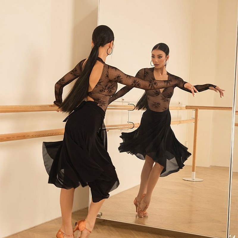Black sheer mesh skirt, back view in motion