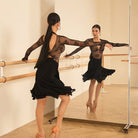 Black sheer mesh skirt, back view at the barre