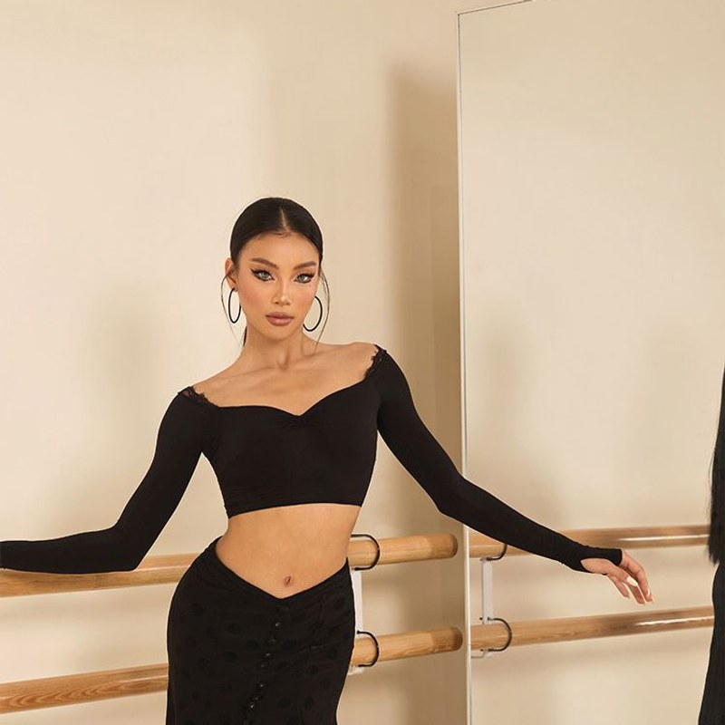 Black lace trim long sleeve Latin dance crop top for Latin practice, front view at the barre