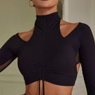 Black mock neck long sleeve crop top, front close-up