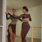 Plaid mock neck long sleeve crop top, back view of the sheer mesh back